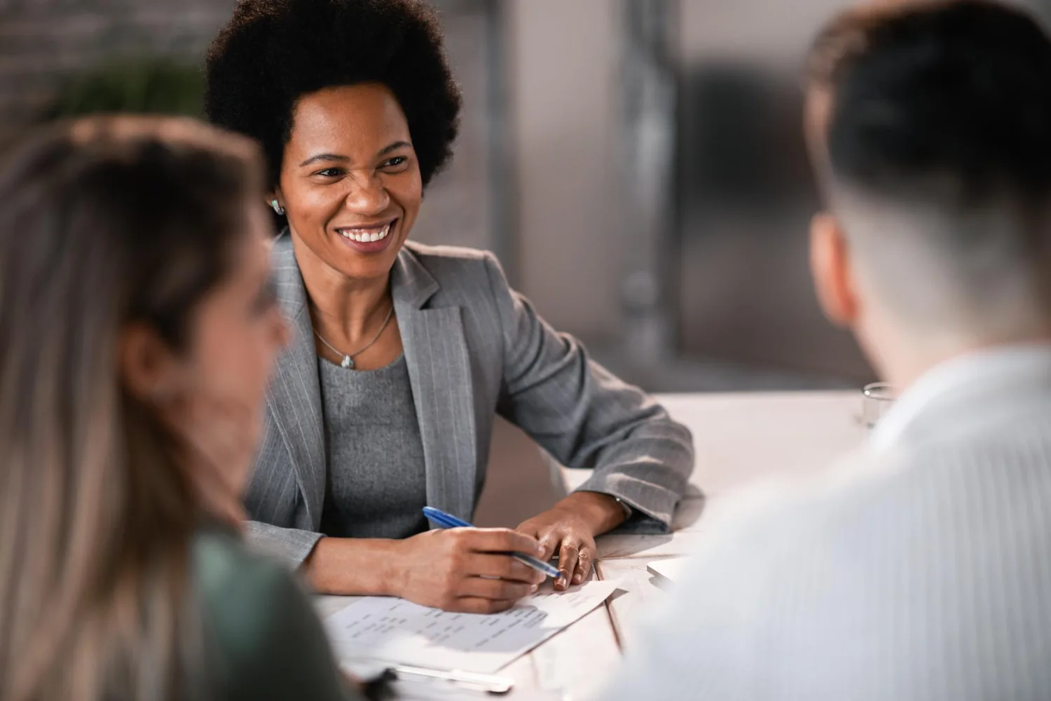 A professional talking with a colleague